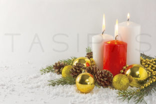 Burning Candles in Snow for Holidays